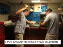 nav repair team: This delicate electronic job as carried out by the specialists 